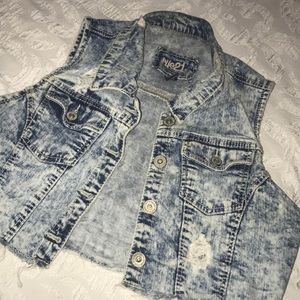 Cropped jean vest.